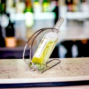 NIB Wine Display Brookstone Wine Holder Polished Silver Chrome Wine Serving Arc